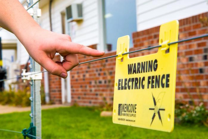 Electric fence warning in neighbourhood