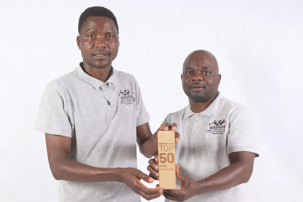 he determined team behind Raddie Trading stands together, proudly presenting their wooden Procompare.co.za TOP 50 trophy—a testament to their elite status as one of South Africa’s most reliable and top-rated service providers for 2025.